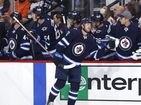 Winnipeg Jets centre Jansen Harkins (12) celebrates his first period goal against the Edmonton Oilers at Canada Life Centre. James Carey Lauder-USA TODAY Sports