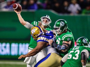 Saskatchewan Roughriders quarterback Cody Fajardo (7) throws a pass against the Winnipeg Blue Bombers in the second half during the CFL Western Conference Final football game at Mosaic Stadium on Nov. 17, 2019.