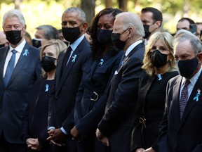 From left to right: Former president Bill Clinton, former first lady Hillary Clinton, former president Barack Obama, former first lady Michelle Obama, President Joe Biden, First Lady Jill Biden and former New York City mayor Michael Bloomberg attend the annual 9/11 commemoration ceremony at the National 9/11 Memorial and Museum on Sept. 11, 2021 in New York City.