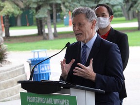 Liberal MP for Winnipeg South Terry Duguid takes questions from media at the Forks on Thursday after announcing a $1 billion national investment in water protection. James Snell/Postmedia