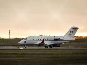 A Canadian Forces Challenger jet takes off from the Calgary International Airport in Calgary, Alta., Saturday, Sept. 25, 2021.