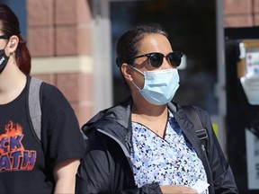 People wearing masks in the Osborne Village area in Winnipeg on Mon., Sept. 27, 2021. KEVIN KING/Winnipeg Sun/Postmedia Network