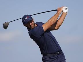 Team USA's Dustin Johnson hits his tee shot on the 4th hole during the Four-balls at the 2020 Ryder Cup at Whistling Straits, Sheboygan, Wisconsin, U.S. on September 25, 2021.