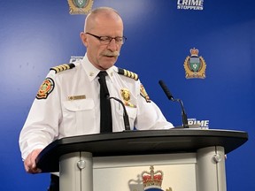 Winnipeg Fire and Paramedic Service Acting Deputy Chief Ihor Holowczynsky addresses the media at a briefing on Friday announcing that a 21-year-old woman had been charged with mischief over $5,000 after she allegedly climbed up a crane in a construction site in the West Broadway area of Sherbrook Street and Wolseley Avenue on Thursday evening.