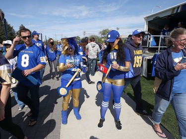 The appropriate colours and props for Winnipeg Blue Bombers fans in the tailgate area ahead of the Banjo Bowl battle against the Saskatchewan Roughriders in Winnipeg on Saturday, Sept. 11, 2021.