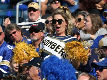 A Winnipeg Blue Bombers fan shakes it up in the stands during the Banjo Bowl against the Saskatchewan Roughriders in Winnipeg on Saturday, Sept. 11, 2021.