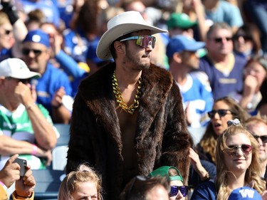 A Winnipeg Blue Bombers fan dressed as former QB Chris Streveler for the Banjo Bowl against the Saskatchewan Roughriders in Winnipeg on Saturday, Sept. 11, 2021.