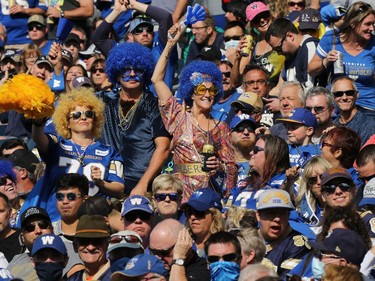 Fans having fun during the Banjo Bowl between the Winnipeg Blue Bombers and Saskatchewan Roughriders in Winnipeg on Saturday, Sept. 11, 2021.