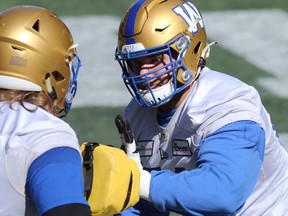 Offensive lineman Drew Desjarlais (right) during Winnipeg Blue Bombers practice in Winnipeg on Tuesday, Sept. 14, 2021.