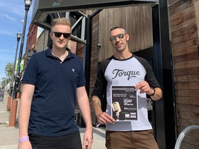 Tim Partridge (right), a paramedic, and Ben Chidwick pose for a photograph outside The Park Theatre on Osborne Street in Winnipeg on Friday, Sept. 10, 2021. Four bands that include first responders will play a fundraising concert, Responderpalooza: Songs for Sophie, there on Oct. 20 to assist in the care of Chidwick's five-year-old daughter Sophie, who has a rare genetic neurodevelopment disorder. The fundraising showcase was originally scheduled for April 7, 2020, but had to be postponed due the COVID-19 pandemic and the resulting Manitoba public health restrictions.