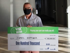 Retired teacher James Hopfner poses for a photo after receiving $100,000 from the provinces second Vax to Win lottery.  James Snell/Winnipeg Sun