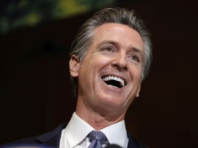 California Gov. Gavin Newsom speaks during a news conference at Kingston 11 Cuisine on October 08, 2021 in Oakland, California.