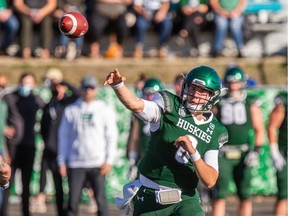 Huskies' quarterback Mason Nyhus, shown during a recent home game, helped his team clinch first place Saturday in Winnipeg.