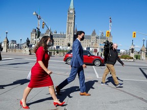 Deputy Prime Minister and Minister of Finance Chrystia Freeland, and Canada's Prime Minister Justin Trudeau leave a news conference in Ottawa, Ontario, Canada, October 6, 2021.
