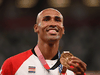 Canadian gold medallist Damian Warner celebrates during the medal ceremony for the men's decathlon event during the Tokyo 2020 Olympic Games, August 6, 2021.