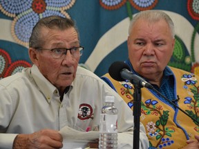 Manitoba Métis Federation president David Chartrand (right) joined by 82-year-old Métis citizen George Lavallee (left) during a press conference in Winnipeg on Friday, Oct. 29, 2021, to announce that MMF is taking the Manitoba government to court in a lawsuit they said will fight for the rights of Métis hunters and harvesters. Photo by