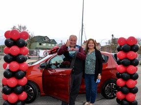 Manitoba Metis Federation (MMF) President David Chartrand and board of directors spokeswoman Anita Campbell show off the brand new Chevy Spark that was won on Friday by Red River Métis Nation citizen Jason Boitson, as part of the MMF’s Get Out and Vote contest.