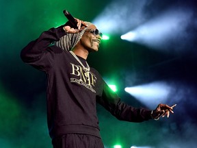 Snoop Dogg performs onstage during the BMF world premiere screening and concert at Cellairis Amphitheatre at Lakewood on September 23, 2021 in Atlanta, Georgia.