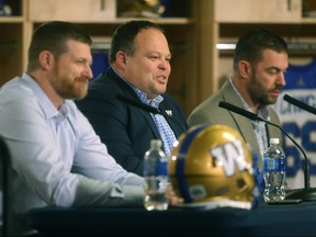 The foundation for the Bombers current success was laid eight years ago when CEO Wade Miller (centre) hired general manager Kyle Walters (right) and head coach Mike O’Shea (left).