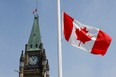 File photo of Canadian flag flying at half-mast on Parliament Hill in Ottawa, Ontario, Canada.