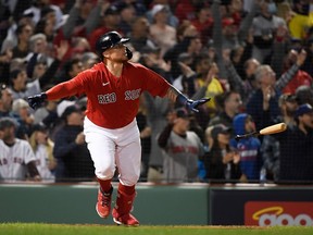 Oct 10, 2021; Boston, Massachusetts, USA; Boston Red Sox catcher Christian Vazquez (7) reacts after hitting a walk-off two run home run against the Tampa Bay Rays during the thirteenth inning in game three of the 2021 ALDS at Fenway Park. Mandatory Credit: Bob DeChiara-USA TODAY Sports