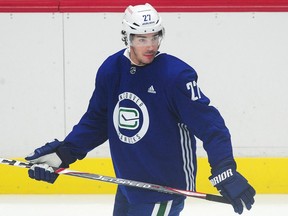 Travis Hamonic has yet to be at Canucks training camp. Why he's been absent hasn't been revealed by the team.