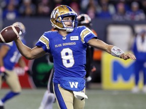 Winnipeg Blue Bombers QB Zach Collaros throws on the run against the B.C. Lions at IG Field in Winnipeg on Saturday, Oct. 23, 2021.