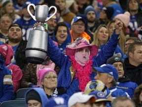 Winnipeg Blue Bombers fans have visions of the Grey Cup after beating the B.C. Lions at IG Field in Winnipeg to clinch first in the West Division on Saturday, Oct. 23, 2021.