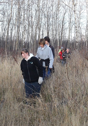 Volunteers take part in the search for two missing women on Oct. 10, 2008, just east of Highway 305 near Long Plain First nation southwest of Portage la Prairie. Volunteers helped professional searchers from the Manitoba Search and Rescue (MSAR) Association scour a 16-km radius around Portage la Prairie for Amber Lynn McFarland and Jennifer Leigh Catcheway. McFarland, 24, has been missing since Oct. 18. She was last spotted leaving a Portage bar. Catcheway was last seen June 19, her 18th birthday, in Grand Rapids.