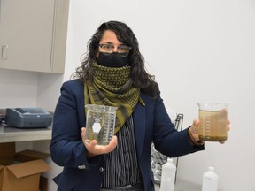 City of Selkirk manager of utilities Raven Sharma shows samples of what wastewater often looks like coming into the plant, and how much cleaner it looks once it has been treated. Dave Baxter/Winnipeg Sun