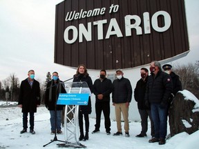 Ontario Minister of Transportation Caroline Mulroney speaks at an announcement as representatives from the federal government, Shoal Lake #39, City of Kenora and the Ontario Provincial Police look on at the Ontario/Manitoba border on Friday, Nov. 19. Ryan Stelter/Miner and News/Postmedia Network