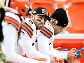 Cleveland Browns quarterback Baker Mayfield sits on the bench during the second half of a game against the New England Patriots at Gillette Stadium.