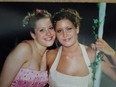 Amber McFarland (left) and her twin sister Ashley pose for a picture at their high school graduation. Amber McFarland was just 24 years old when she was last seen by friends at a night club in Portage la Prairie at around 1 a.m. on Oct. 18, 2008.