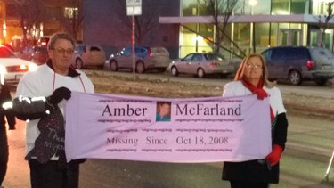 Scott and Lori McFarland attend a memorial march in Winnipeg for missing and murdered women and girls. Amber McFarland was just 24 years old when she was last seen by friends at a night club in Portage la Prairie at around 1 a.m. on Oct. 18, 2008.