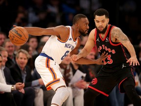 Knicks' Kemba Walker controls the ball against Raptors' Fred VanVleet during the first quarter at Madison Square Garden on Monday, Nov. 1, 2021.