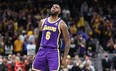 LeBron James #6 of the Los Angeles Lakers celebrates in the 124-116 OT win against the Indiana Pacers at Gainbridge Fieldhouse on November 24, 2021 in Indianapolis, Indiana.