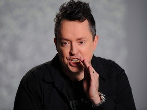 Montreal comedian Mike Ward poses for photos in 2014.