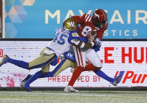 Calgary Stampeders Luther Hakunavanhu TD catch against the Winnipeg Blue Bombers  in CFL action at McMahon stadium in Calgary on Saturday, November 20, 2021. Darren Makowichuk/Postmedia