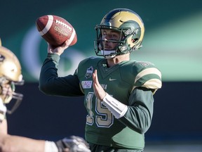 University of Regina Rams quarterback Bryce Welter throws a pass against the University of Manitoba Bisons on Saturday at Mosaic Stadium.