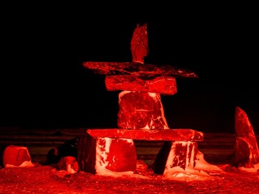 An inukshuk is pictured on the shores of Hudson Bay during a blizzard in Churchill, Man., on Nov. 21, 2021.
