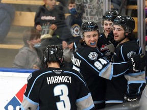 Winnipeg Ice forward Zachary Benson (second from right) celebrates his goal against the Red Deer Rebels during WHL action at Wayne Fleming Arena on the University of Manitoba campus in Winnipeg with (from left) Omen Harmacy, Connor McClennon and Matthew Savoie on Sunday, Nov. 7, 2021.