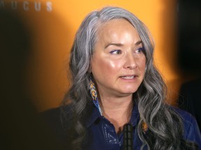 Nahanni Fontaine, house leader of the Official Opposition, meets with media following the throne speech at the Manitoba Legislative Building in Winnipeg on Tuesday, Nov. 23, 2021.