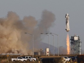 A Blue Origin New Shepard rocket lifts off with a crew of six, including Laura Shepard Churchley, the daughter of the first American in space Alan Shepard, for whom the spacecraft is named, from Launch Site One in Van Horn, Texas, Saturday, Dec. 11, 2021.