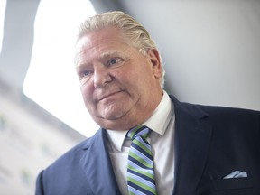 Ontario Premier Doug Ford attends an announcement at Mississauga Hospital, in Mississauga, Ont., Wednesday, Dec. 1, 2021.