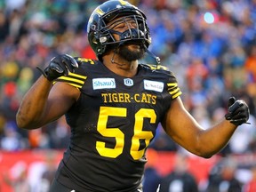 The Bombers’ offensive line will have its hands full with Hamilton Tiger-Cats’ defensive end Ja’Gared Davis. Al Charest/Postmedia