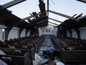 Interior view of tornado damage to Emmanuel Baptist Church in Mayfield, Ky., Saturday, Dec. 11, 2021. Multiple tornadoes tore through parts of the lower Midwest late on Friday night, leaving a large path of destruction.
