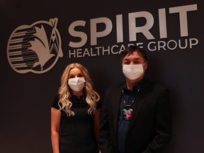 Spirit Healthcare Group CEO Heather Berthelette and Long Plain First Nation Chief Dennis Meeches are seen wearing compostable masks that are now being manufactured because of a partnership between Spirit Healthcare Group and the Precision ADM Medical company.
