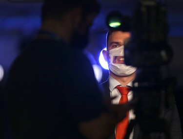 A member of the media is seen wearing a see through mask at the Manitoba Progressive Conservative Party's leadership convention in Winnipeg on October 30. Chris Procaylo/Winnipeg Sun