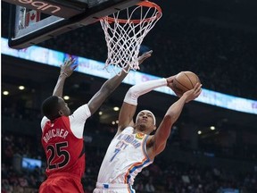 Oklahoma City Thunder forward Darius Bazley drive to the basket as Toronto Raptors forward Chris Boucher tries to defend during the first quarter at Scotiabank Arena.