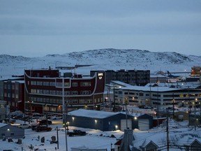 Downtown Iqaluit, Nunavut, is shown after 2 p.m. sunset on Tuesday, Nov. 24, 2020.